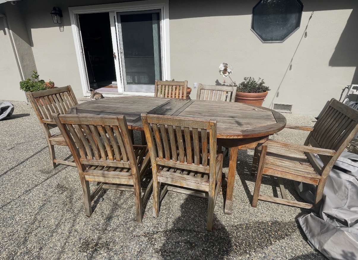 Oval teak set before